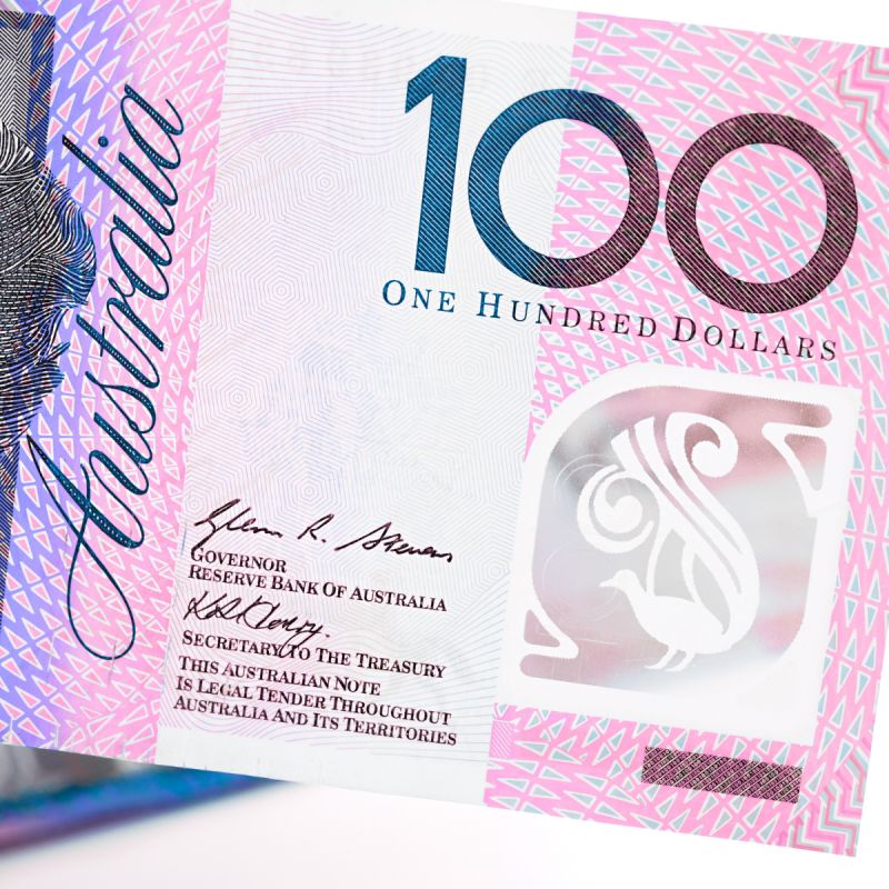 A $100 bill representing the commercial value of winning government and corporate tenders